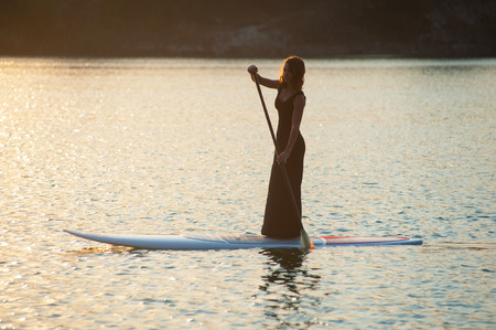 Woman on Paddle Board